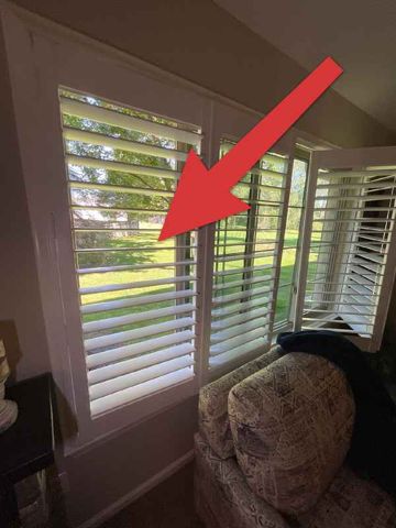 Hairline crack at window corner