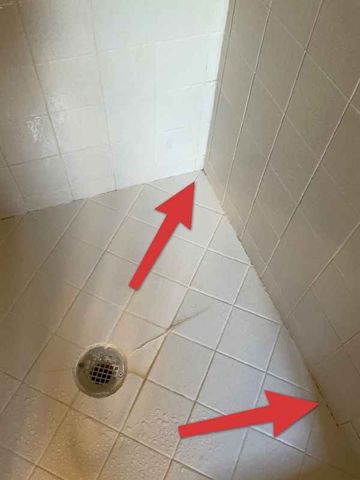 Missing caulk at valve and curb