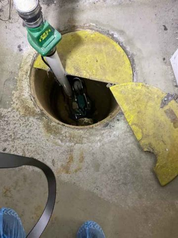 Sump pit – discharge routed to drain stack